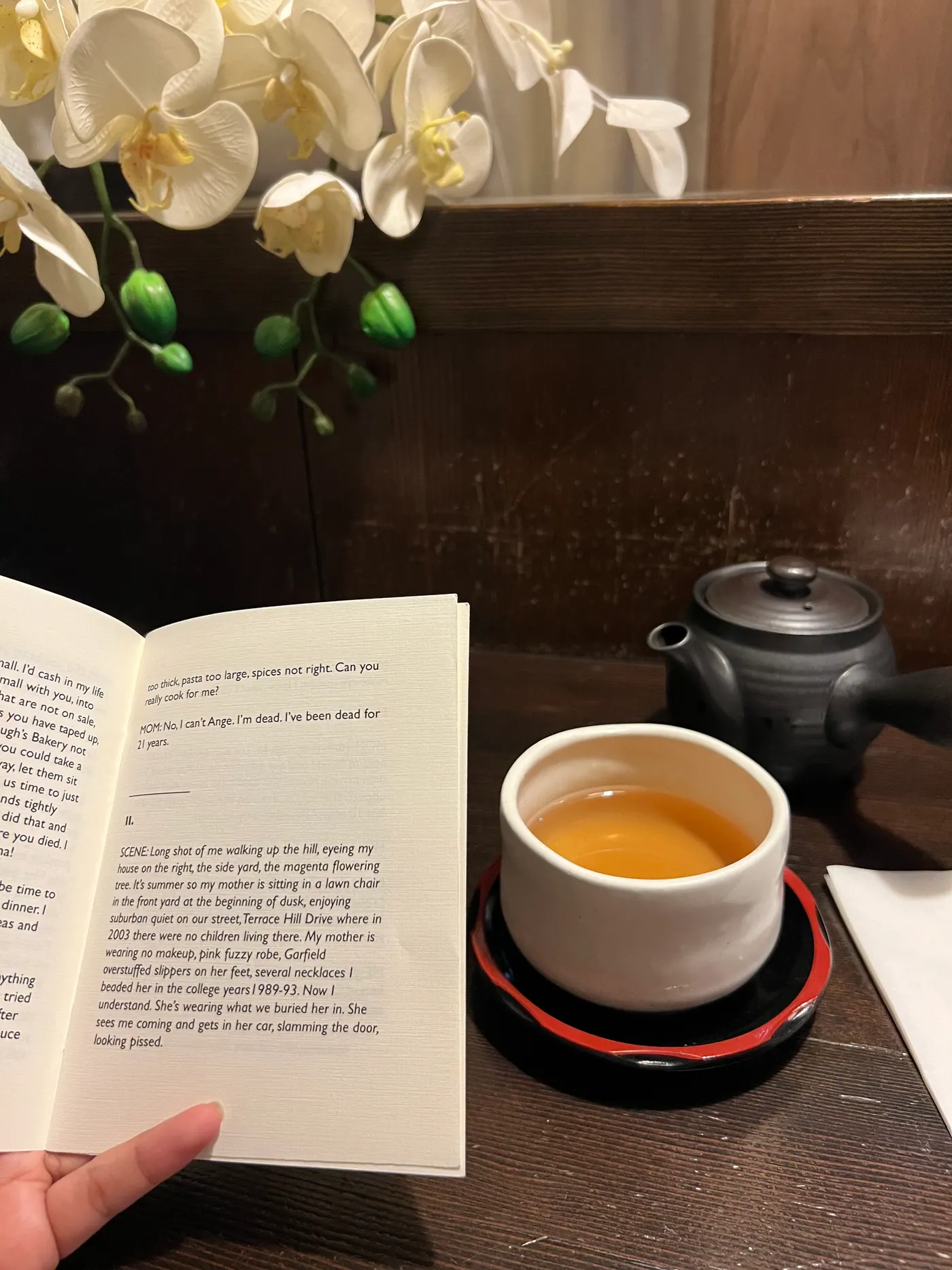 Hiding in a Manhattan tea shop with a book.
